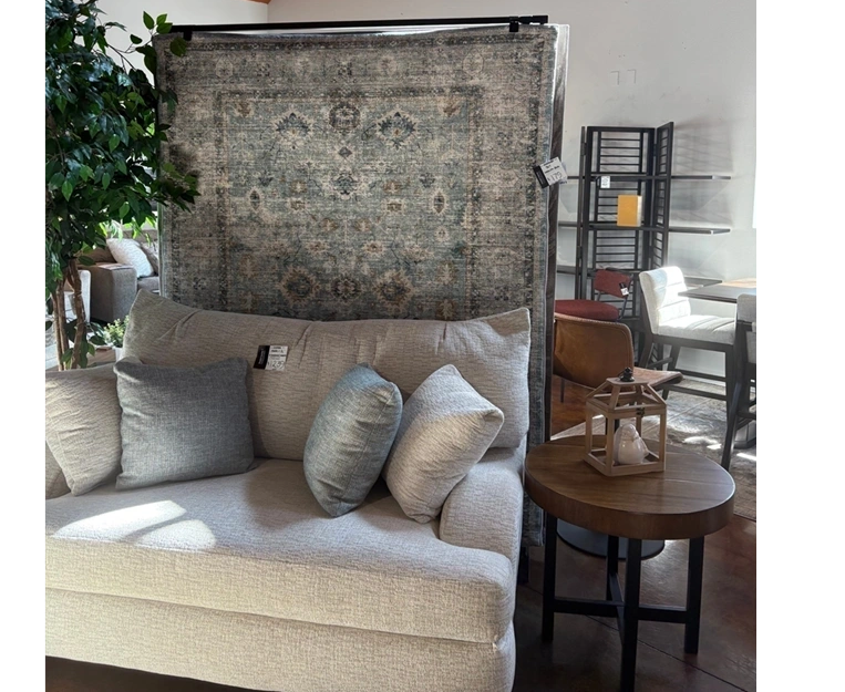 Rug display in a furniture showroom